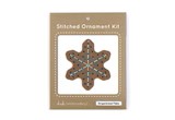 Wooden snowflake shape with holes embroidery thread in paper package